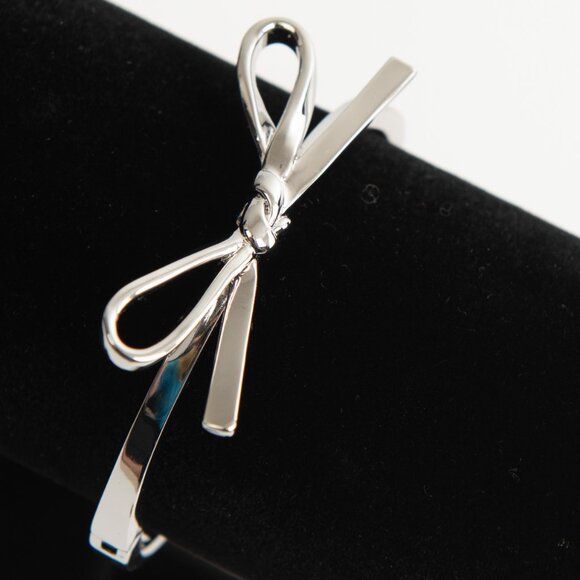 kate spade Jewelry - Kate Spade Skinny Mini Bow Bangle Bracelet Silver